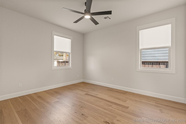 203 E 45th Ct, Tulsa, OK 74105 - empty room featuring light wood-style flooring and a ceiling fan