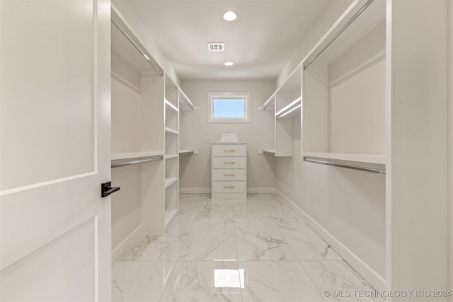 203 E 45th Ct, Tulsa, OK 74105 - walk in closet with light marble finish flooring