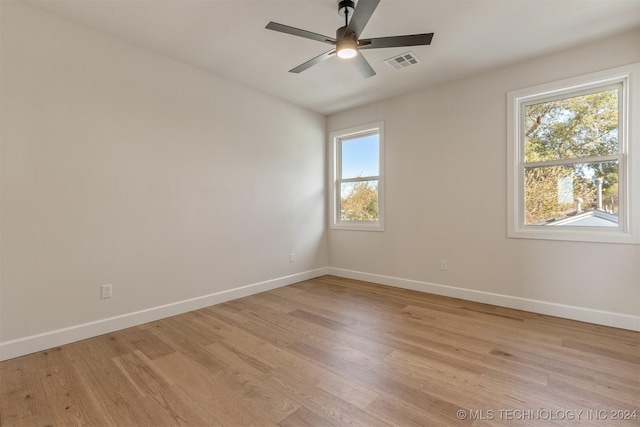 203 E 45th Ct, Tulsa, OK 74105 - spare room featuring light wood-style floors and ceiling fan