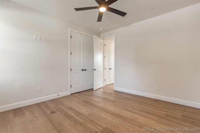 203 E 45th Ct, Tulsa, OK 74105 - empty room with ceiling fan and light wood-style flooring