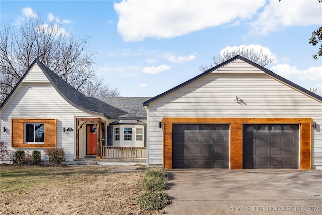 ranch-style house featuring a garage