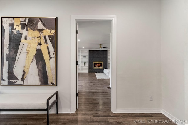 hallway featuring dark wood-type flooring