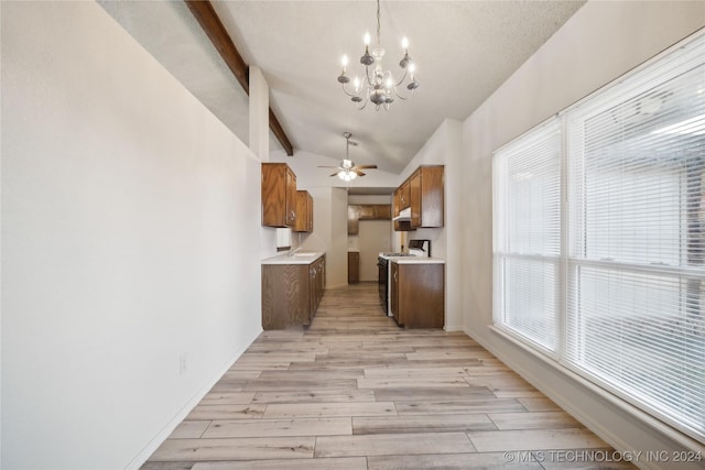 kitchen with white appliances, ceiling fan with notable chandelier, vaulted ceiling with beams, a textured ceiling, and light hardwood / wood-style floors