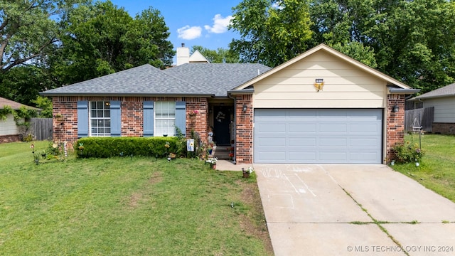 ranch-style home with a front yard and a garage