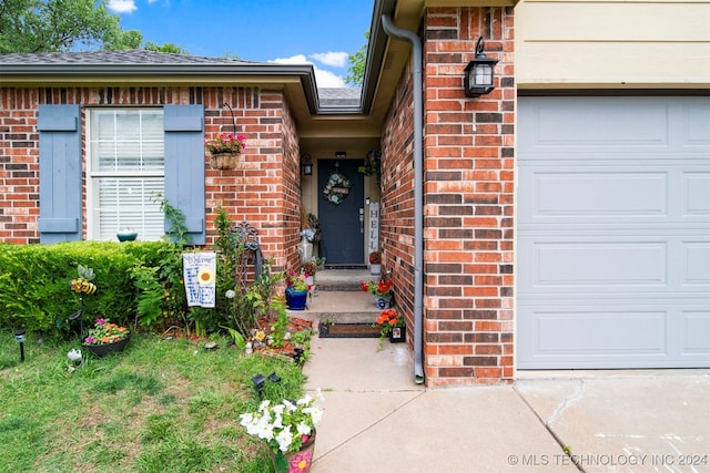 property entrance featuring a garage