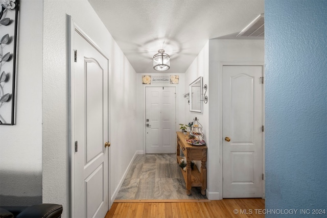 hall featuring light hardwood / wood-style floors