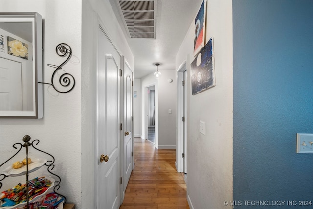 hall featuring hardwood / wood-style flooring