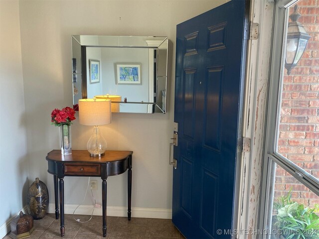 entrance foyer with tile patterned flooring