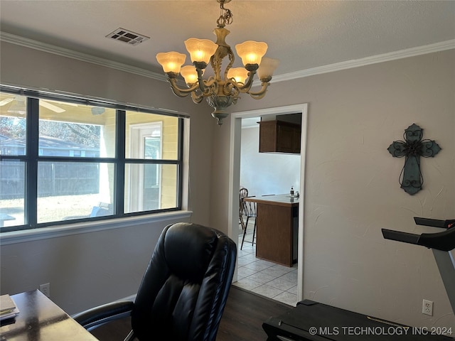 office space featuring a chandelier, ornamental molding, and wood-type flooring