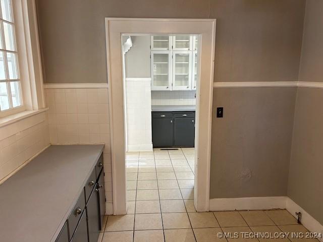 interior space featuring light tile patterned flooring