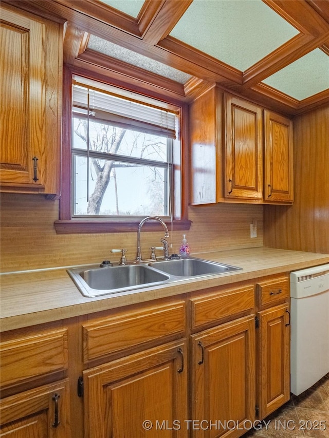 kitchen with white dishwasher and sink