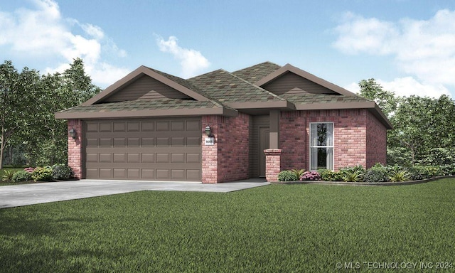 view of front of house featuring a front yard and a garage