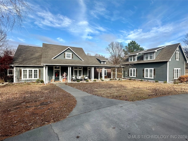 view of property with covered porch