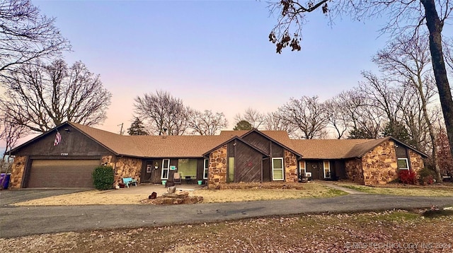 single story home with a garage