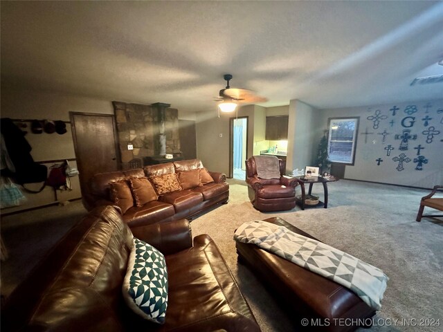 7750 River Ridge Rd, Muskogee, OK 74403 - living area featuring carpet floors and ceiling fan