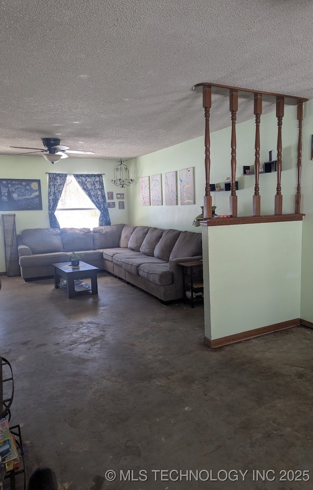 unfurnished living room featuring ceiling fan, concrete floors, and a textured ceiling