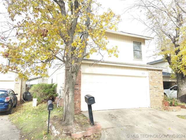 front of property featuring a garage