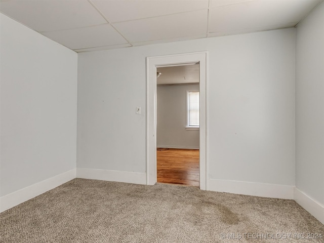 spare room featuring carpet flooring