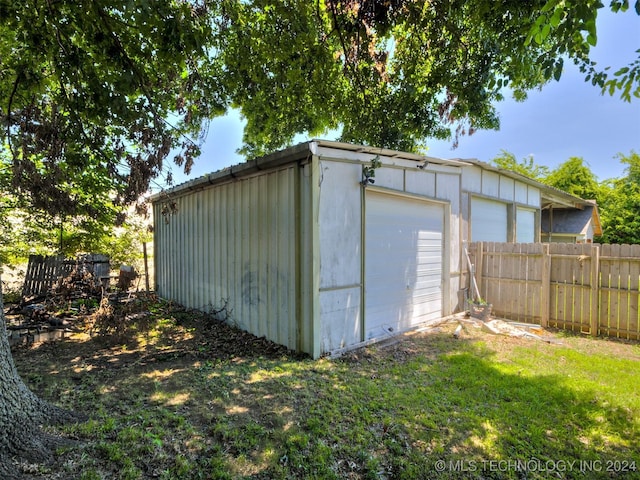 view of outdoor structure featuring a garage