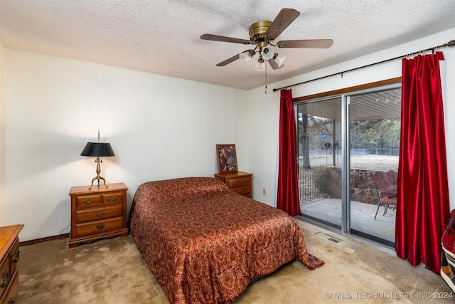 bedroom with access to exterior, light carpet, a textured ceiling, and ceiling fan