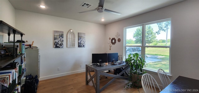 office space featuring light hardwood / wood-style flooring and ceiling fan