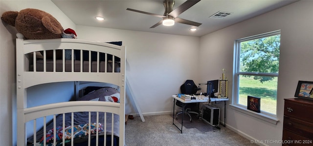 carpeted bedroom with ceiling fan