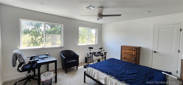 carpeted bedroom featuring ceiling fan