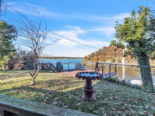 view of yard with a water view