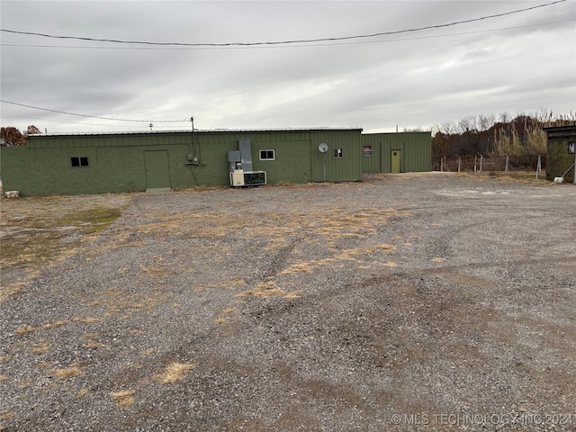 view of outbuilding featuring central AC