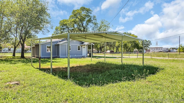 view of yard with a carport