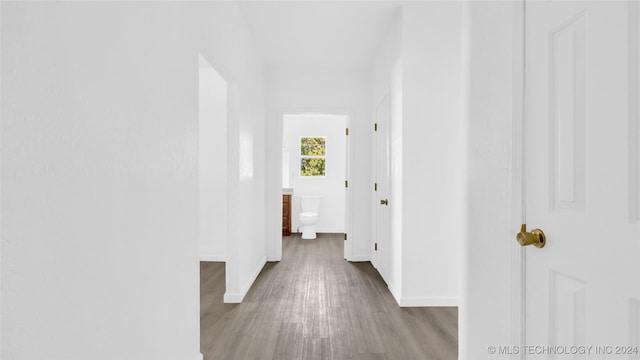 hallway featuring light hardwood / wood-style flooring