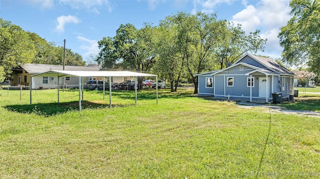 view of yard featuring a carport