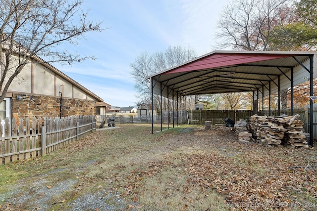 exterior space with a carport