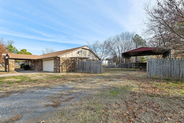 view of home's exterior with a carport