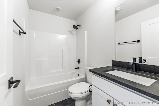 full bathroom with tile patterned flooring, vanity, toilet, and  shower combination