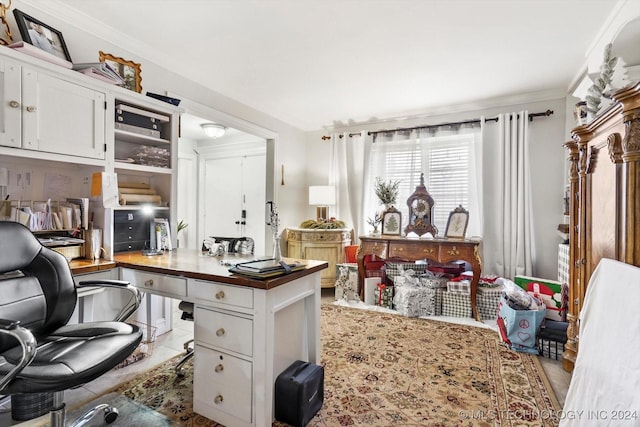 office area featuring light tile patterned floors and ornamental molding