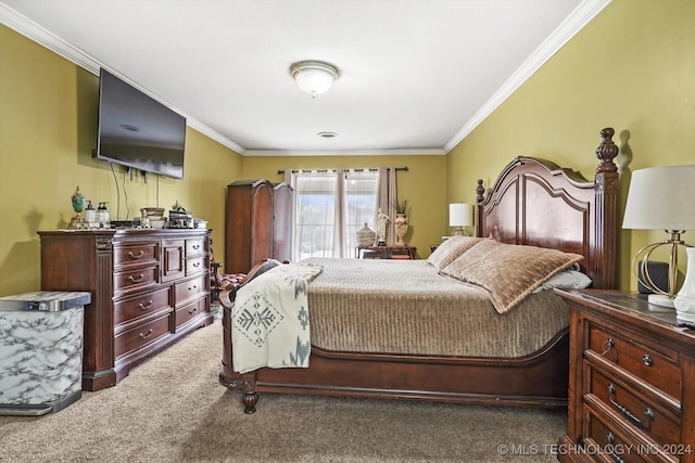 bedroom with dark carpet and ornamental molding