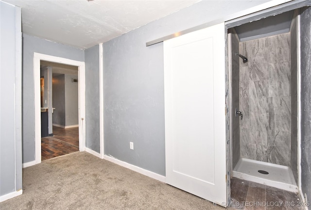 unfurnished bedroom featuring carpet floors