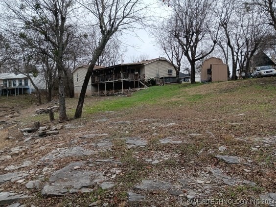 view of yard with a deck