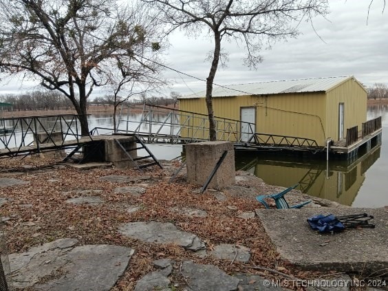 view of dock with a water view