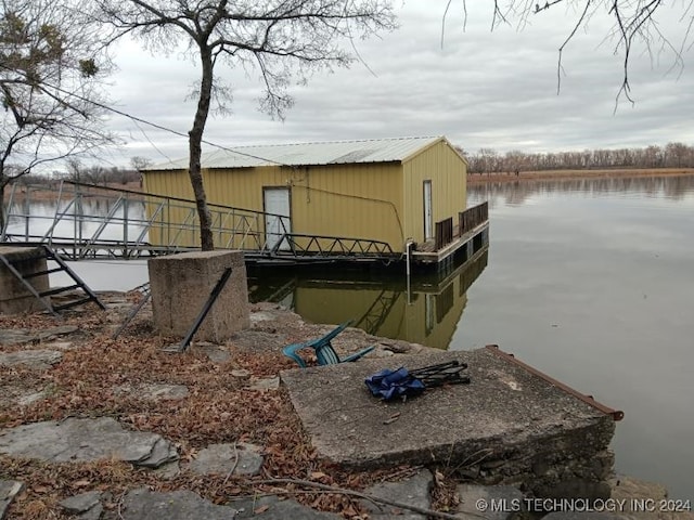 view of dock with a water view