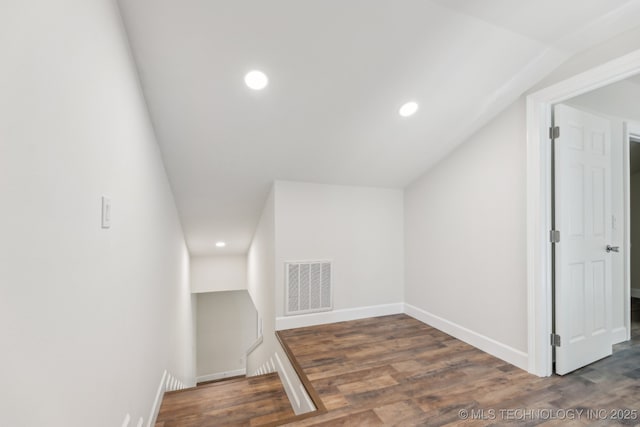 1006 N K St, Muskogee, OK 74403 - bonus room with vaulted ceiling, wood finished floors, and recessed lighting