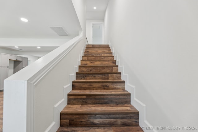 1006 N K St, Muskogee, OK 74403 - stairs featuring recessed lighting and wood finished floors