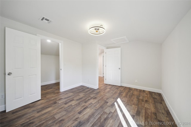 unfurnished room with dark hardwood / wood-style floors