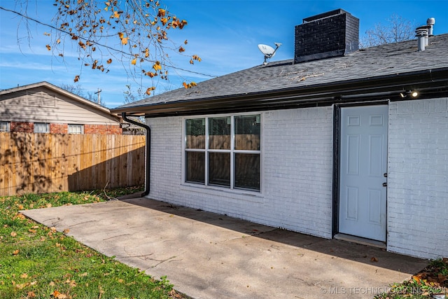 back of house featuring a patio area