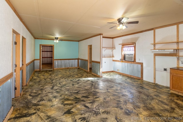 unfurnished room with cooling unit, ornamental molding, and ceiling fan