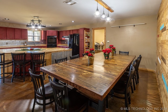 dining space with sink