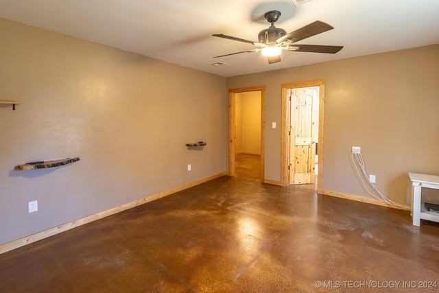 spare room with ceiling fan