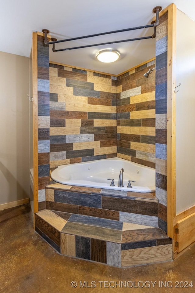 bathroom featuring plus walk in shower and concrete floors