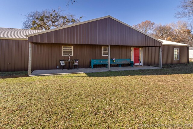 view of outbuilding featuring a yard